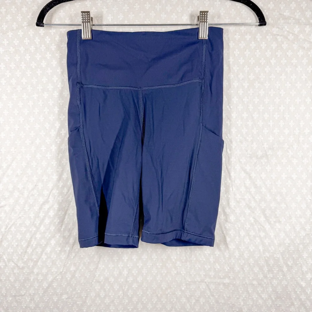 Athleta Dark Blue Ultimate Stash Pocket 7”‎ Bike Shorts